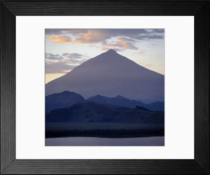 Framed Print : Photographed from Lake Mutanda at sunrise, Mount Muhavura looms like a huge pyramid Framed Print : Photographed from Lake Mutanda at sunrise, Mount Muhavura looms like a huge pyramid