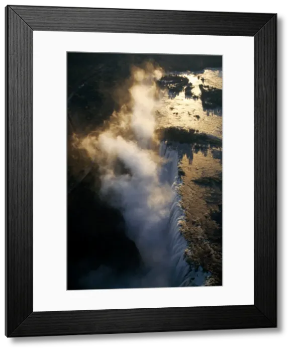 Framed Print : Aerial view of the Zambezi River as it plummets over