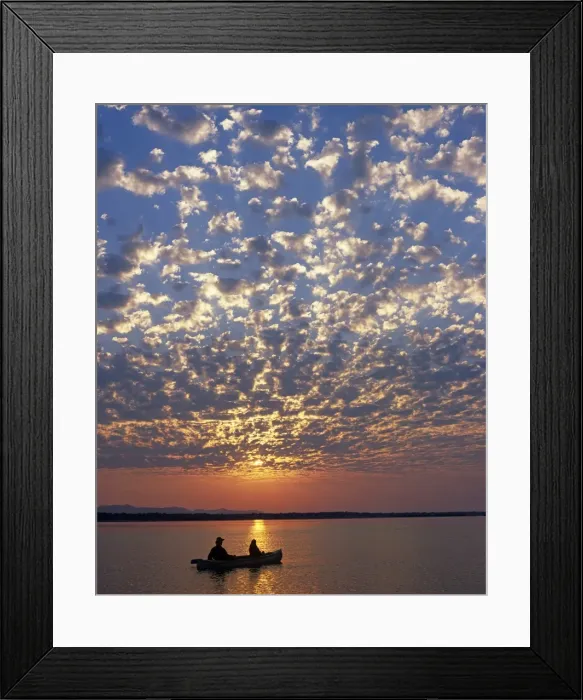 Framed Print : Canoeing under a mackerel sky at dawn on the Zambezi River Framed Print : Canoeing under a mackerel sky at dawn on the Zambezi River
