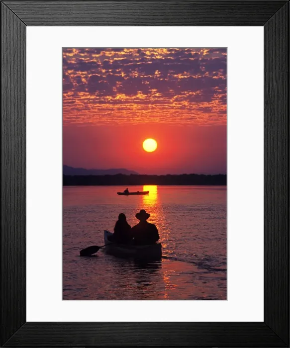 Framed Print : Canoeing at sun rise on the Zambezi River Framed Print : Canoeing at sun rise on the Zambezi River