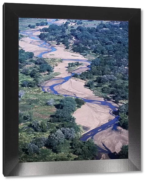 Zambia. Aerial view of the weaving course of a tributary of the Zambezi River
