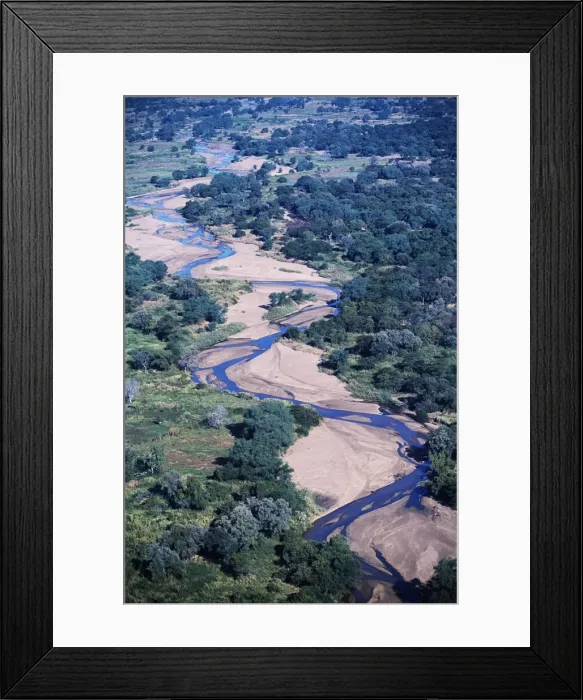 Framed Print : Zambia. Aerial view of the weaving course of a tributary of the Zambezi River Framed Print : Zambia. Aerial view of the weaving course of a tributary of the Zambezi River