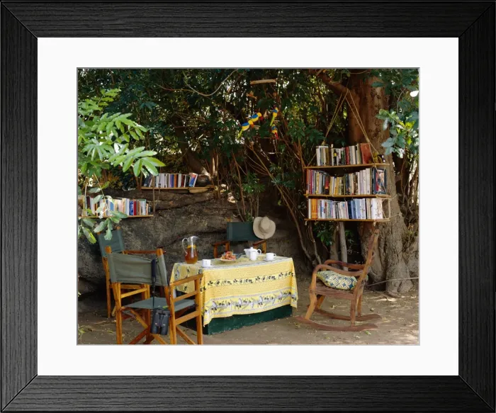 Framed Print : Tea in the library under the shade of a large mahogany Framed Print : Tea in the library under the shade of a large mahogany