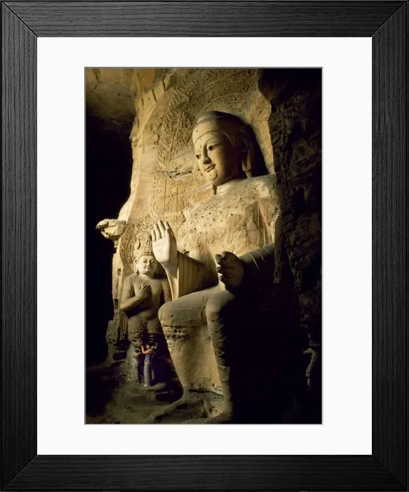 Framed Print : Visitor beside one of the Buddha statues at the 5th Framed Print : Visitor beside one of the Buddha statues at the 5th