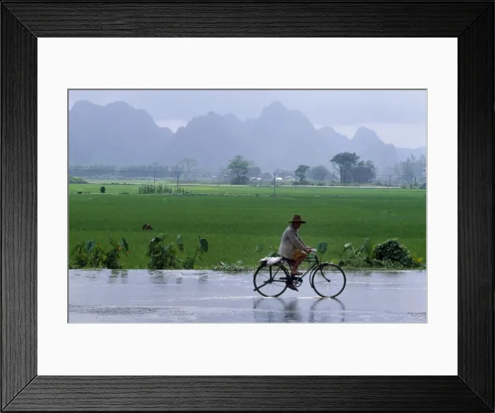 Framed Print : Cyclist after a storm Framed Print : Cyclist after a storm
