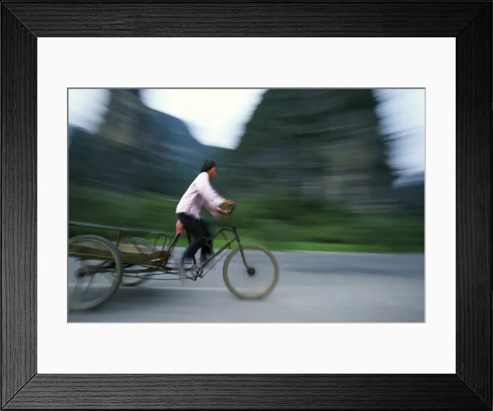 Framed Print : Woman on a three-wheel flatback Framed Print : Woman on a three-wheel flatback