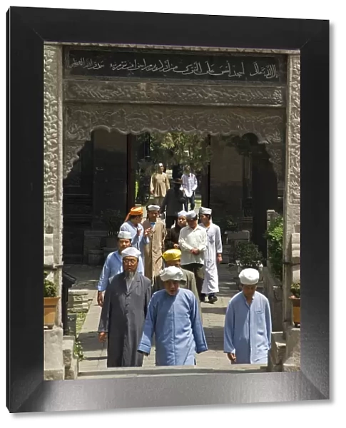 Men going to pray at The Great Mosque located in the Muslim Quarter