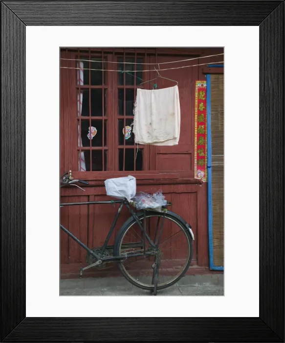 Framed Print : China, Yunnan Province, Dali, Old Town, Bicycle and wall Framed Print : China, Yunnan Province, Dali, Old Town, Bicycle and wall