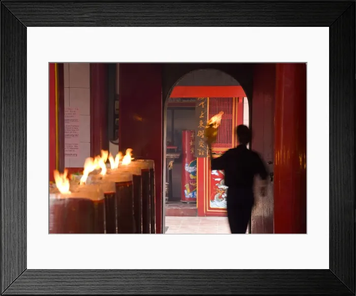 Framed Print : Man with lit paper in Chinese temple Framed Print : Man with lit paper in Chinese temple