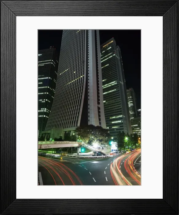 Framed Print : Car light trails under skyscrapers and city buildings Framed Print : Car light trails under skyscrapers and city buildings