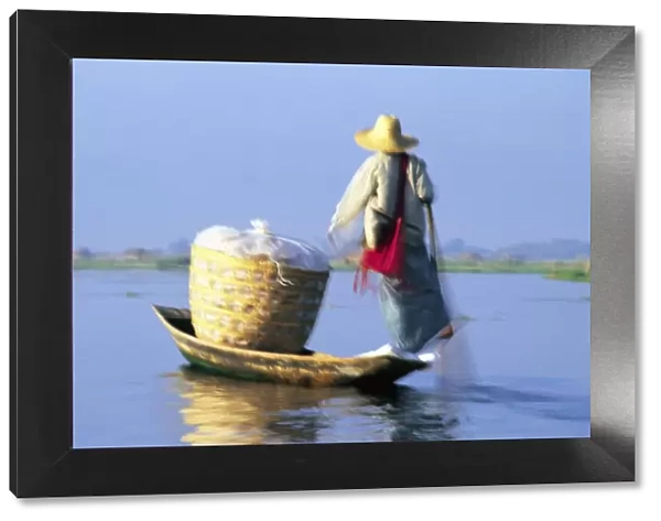 Woman on boat, Lake Inle, Burma
