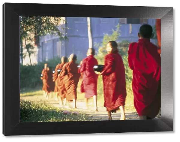 Buddhist monks bearing Alms, Burma