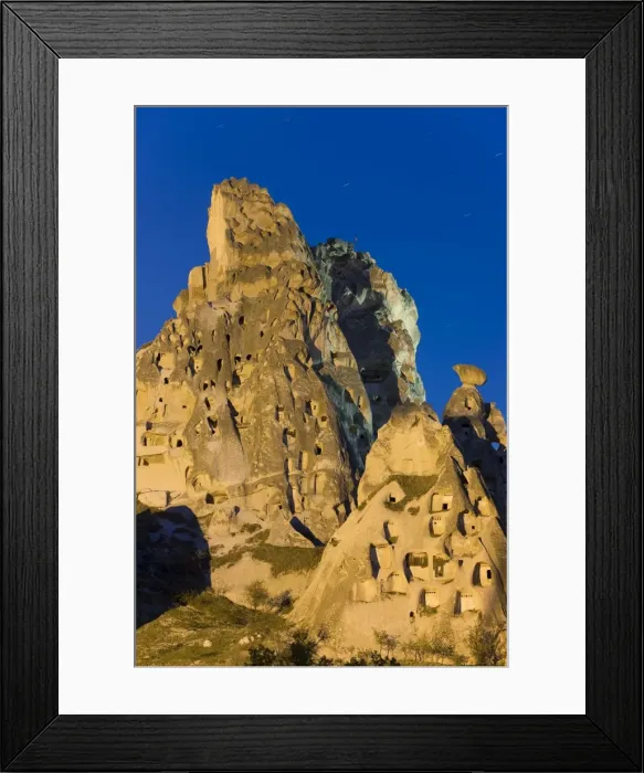 Framed Print : Old troglodytic cave dwellings cut into the rock Castle Framed Print : Old troglodytic cave dwellings cut into the rock Castle