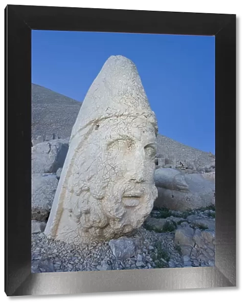 Ancient carved stone head of Zeus
