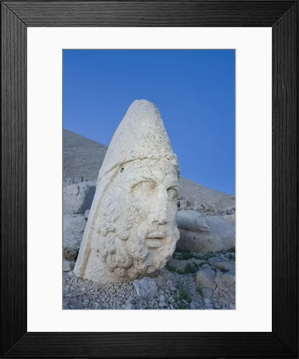 Framed Print : Ancient carved stone head of Zeus