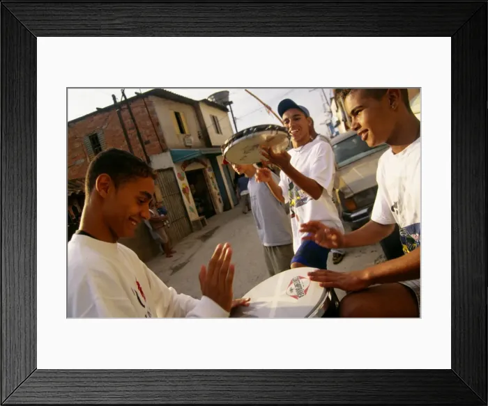 Framed Print : Teenage boys drum and play the tambourine in their neighborhood in Sao Paulo Framed Print : Teenage boys drum and play the tambourine in their neighborhood in Sao Paulo