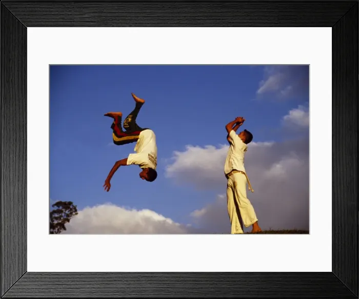 Framed Print : Two boys practice Capoeira, the Brazilian martial art