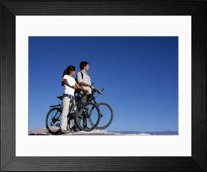Framed Print : Mountain biking amidst the wind-eroded peaks and lunar landscape of Moon Valley Framed Print : Mountain biking amidst the wind-eroded peaks and lunar landscape of Moon Valley