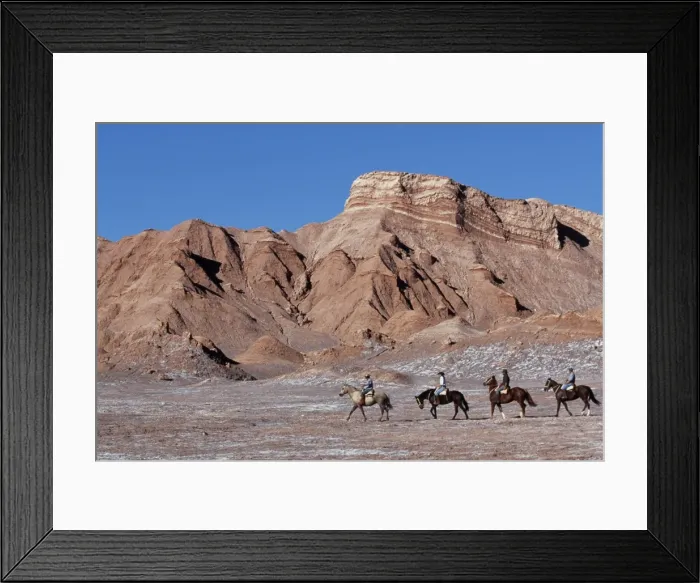 Framed Print : Tourists horse riding amongst the wind-eroded peaks Framed Print : Tourists horse riding amongst the wind-eroded peaks