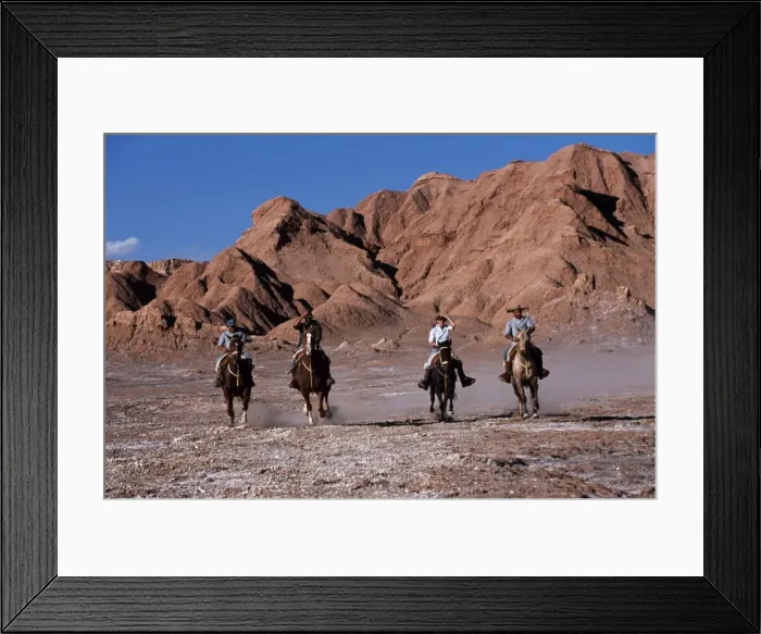 Framed Print : Tourists horse riding amongst the wind-eroded peaks Framed Print : Tourists horse riding amongst the wind-eroded peaks