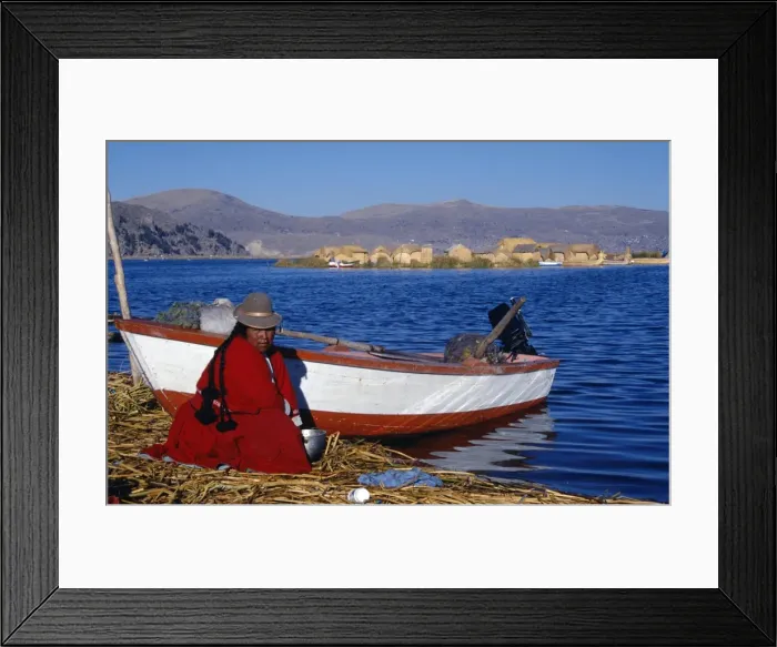 Framed Print : An Indian woman from the Uros or floating reed islands Framed Print : An Indian woman from the Uros or floating reed islands