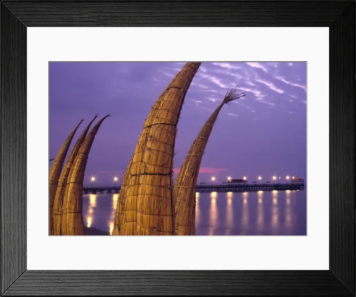 Framed Print : Totora (reed) boats are stacked along the beach