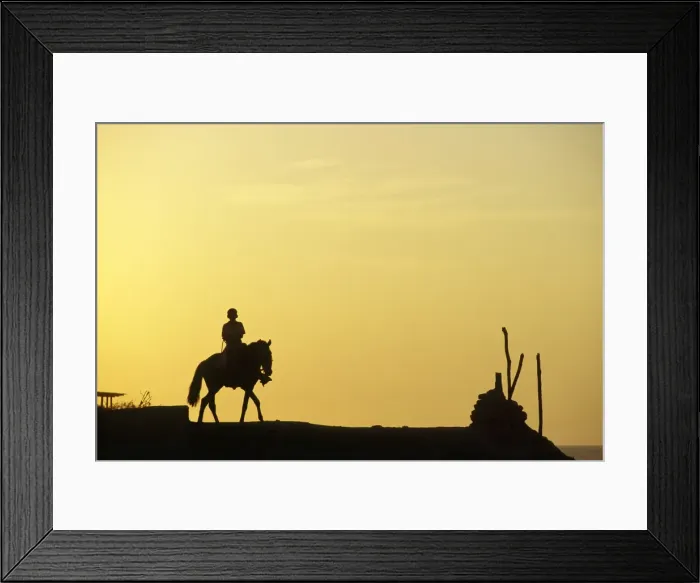 Framed Print : A boy on horseback at the beach village of Mancora Framed Print : A boy on horseback at the beach village of Mancora
