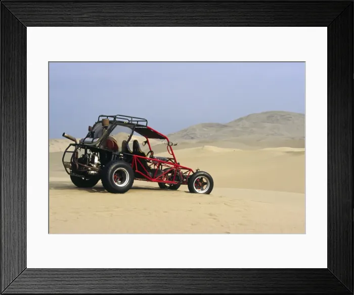 Framed Print : A dune buggy sits in the desert expense of Peru s Framed Print : A dune buggy sits in the desert expense of Peru s