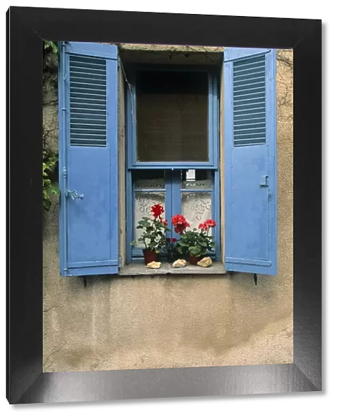 Window and blue shutters