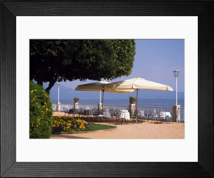 Framed Print : Promenade at Gardone Riviera with tables and chairs Framed Print : Promenade at Gardone Riviera with tables and chairs