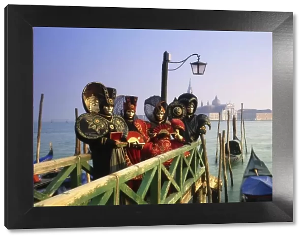 Gondolas & people in Carnival costumes, Piazza San Marco (St