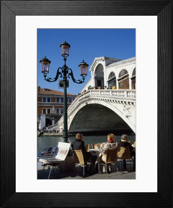 Framed Print : A street cafe overlooking the Gran canal and Rialto Bridge Framed Print : A street cafe overlooking the Gran canal and Rialto Bridge