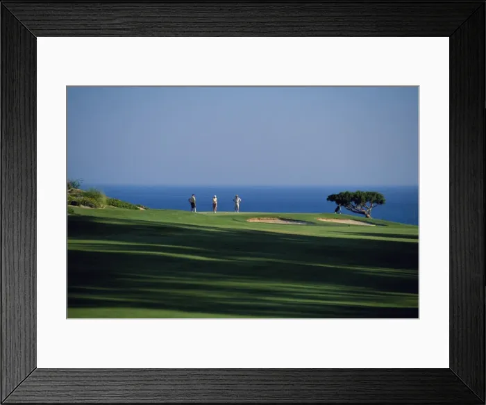 Framed Print : Golfers play on the championship course Framed Print : Golfers play on the championship course