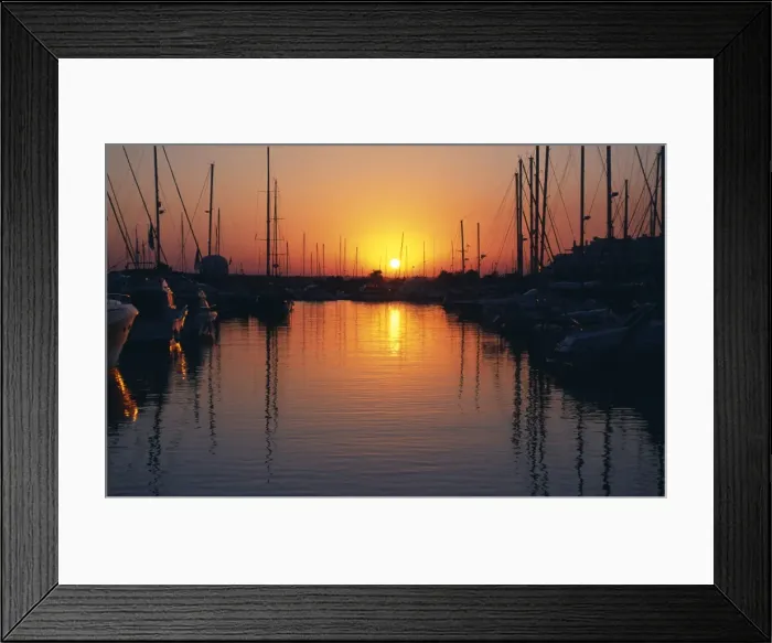 Framed Print : The sun sets over the yachts and pleasure boats in the marina Framed Print : The sun sets over the yachts and pleasure boats in the marina