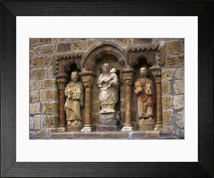 Framed Print : Detail of carved stone figures on the XIIth C Romanesque Framed Print : Detail of carved stone figures on the XIIth C Romanesque