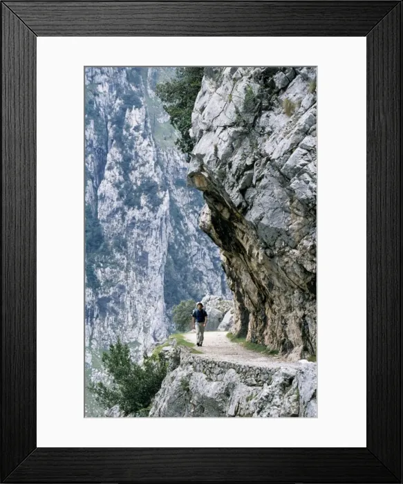 Framed Print : Trekker walks the trail through the Cares Gorge Framed Print : Trekker walks the trail through the Cares Gorge