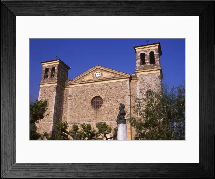 Framed Print : The Catholic church in Potes stands proud and strong over the town Framed Print : The Catholic church in Potes stands proud and strong over the town