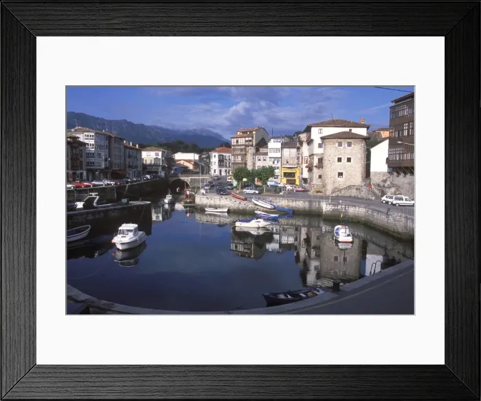Framed Print : The old Harbour in Llanes is surrounded by mansions Framed Print : The old Harbour in Llanes is surrounded by mansions