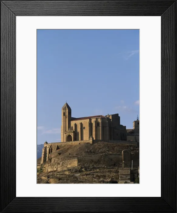Framed Print : The church of the hilltop village of San Vicente rises