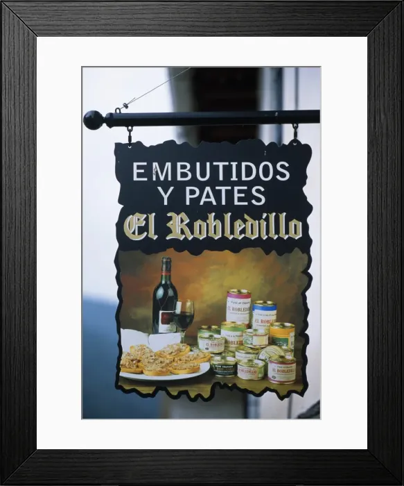 Framed Print : A shop sign advertising sausage and pate for sale in the village of Ortigosa Framed Print : A shop sign advertising sausage and pate for sale in the village of Ortigosa