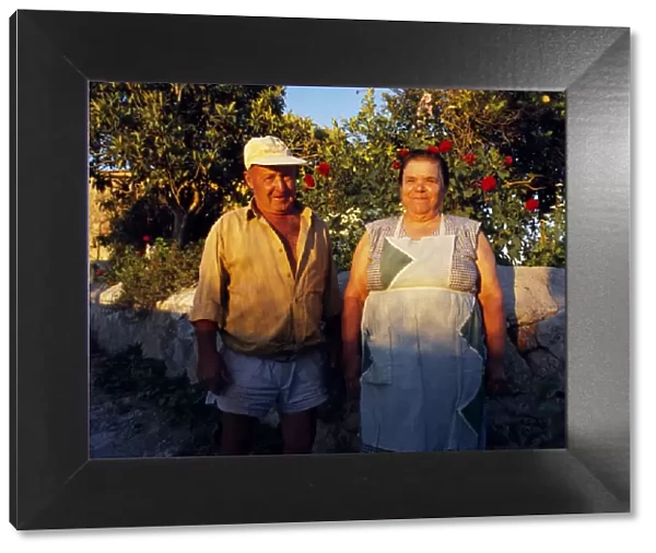 Old Ibethencan Farmer and his wife standing
