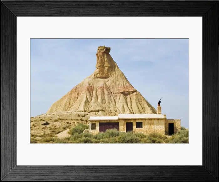 Framed Print : The Bardena Blanca rock outcrop and stone house Framed Print : The Bardena Blanca rock outcrop and stone house
