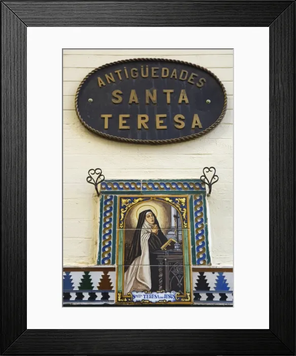 Framed Print : A painted ceramic mural depicting Santa Teresa praying before a cross Framed Print : A painted ceramic mural depicting Santa Teresa praying before a cross