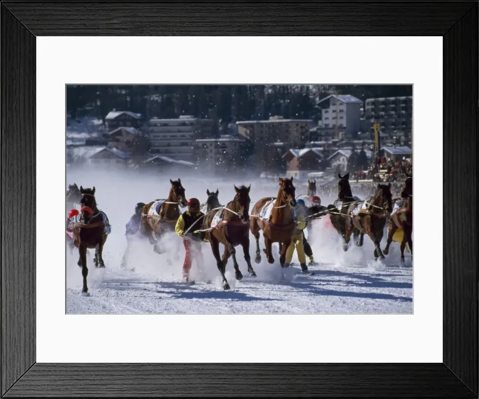Framed Print : Skijoring (Skiing behind a galloping horse) on the frozen lakee at St Moritz Framed Print : Skijoring (Skiing behind a galloping horse) on the frozen lakee at St Moritz