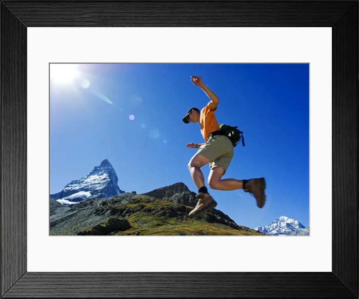 Framed Print : A Matterhorn (4477m) hiker running the trail Framed Print : A Matterhorn (4477m) hiker running the trail