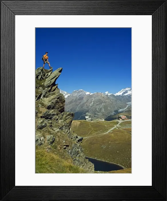 Framed Print : Hiker high on trail above lake at Schwarzee Paradise (MR)