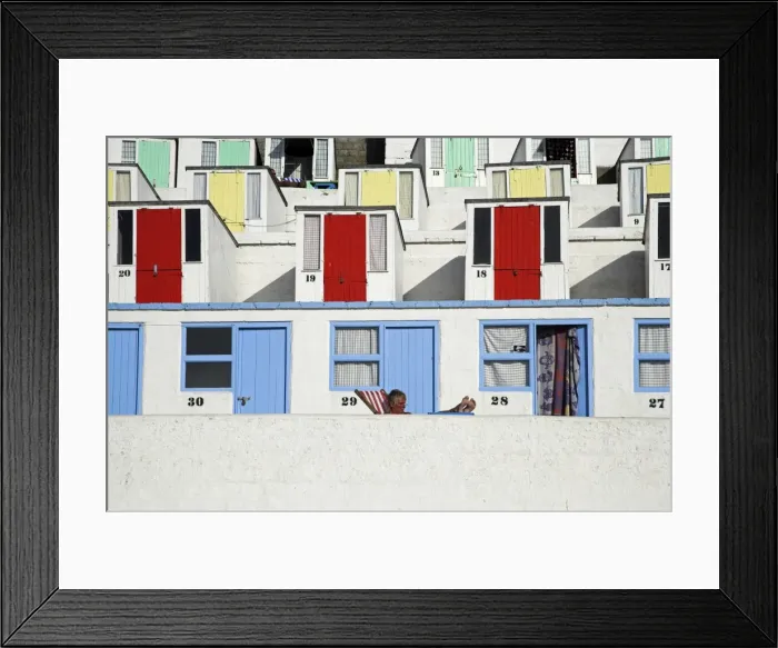Framed Print : Beach huts on Tolcarne Beach Framed Print : Beach huts on Tolcarne Beach