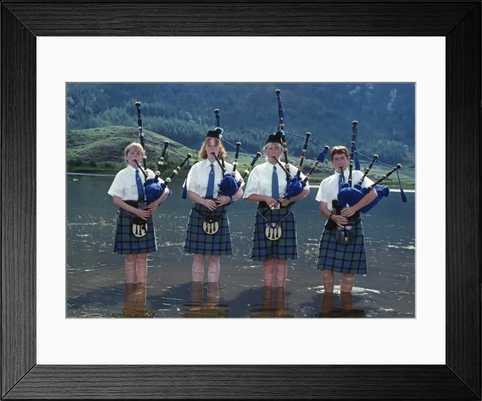 Framed Print : Young pipers cooling down in the loch during a break Framed Print : Young pipers cooling down in the loch during a break