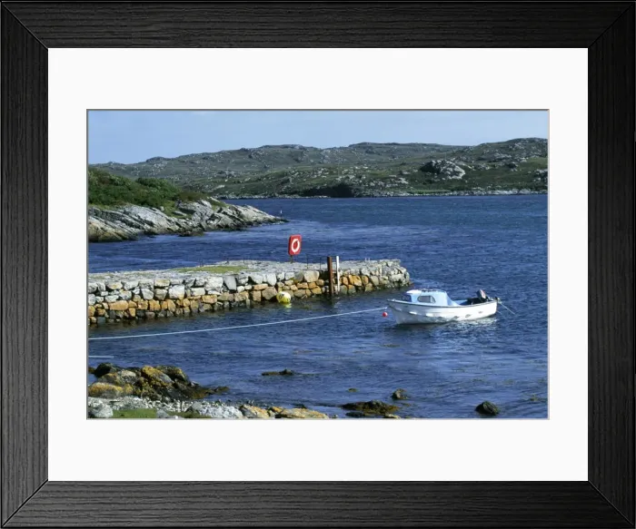 Framed Print : A fishing boat moored in the small harbour of Arinagour Framed Print : A fishing boat moored in the small harbour of Arinagour