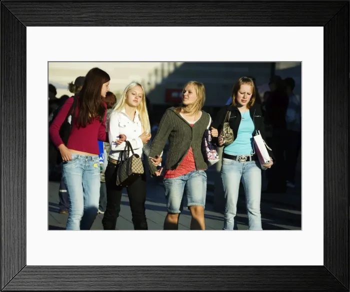 Framed Print : Fashionable Young Girls Walking down Street Framed Print : Fashionable Young Girls Walking down Street